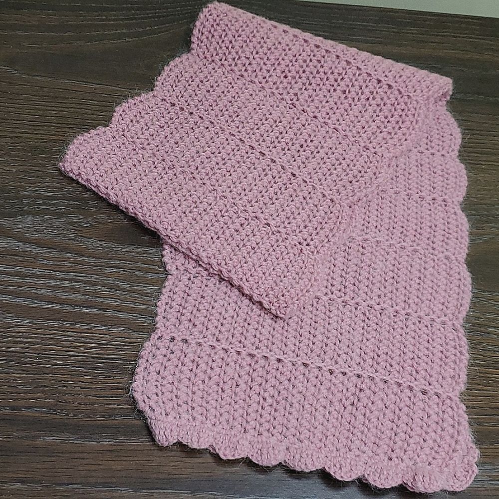 Beautifully hand knit delicate dusty rose color wool scarf